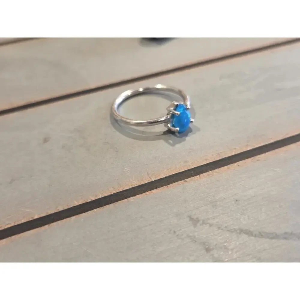 Sterling Silver Ring with Blue Opal Teardrop Stone